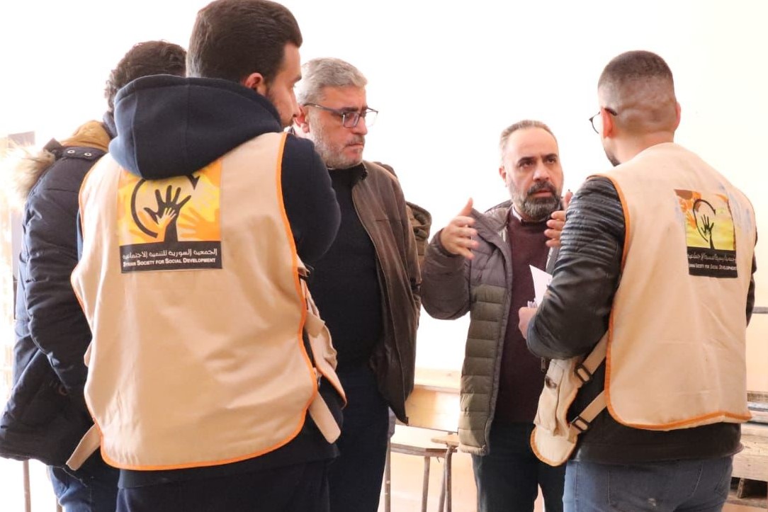 Muthanna speaking with the team in Syria